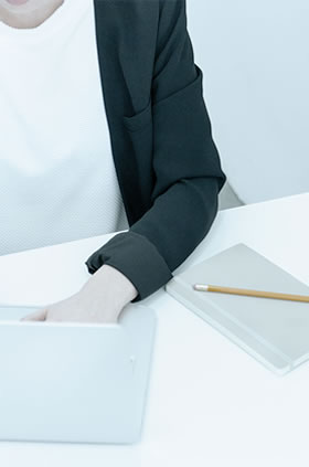 Woman Typing on Keyboard